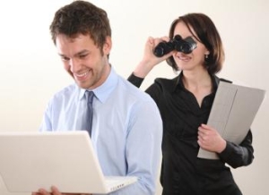 example of an image of a boss spying on a employee