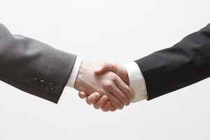 An example of an handshake between two business men