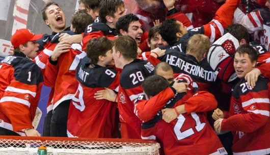 Canada's hockey team celebrating victory