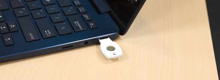 Google security key plugged in a laptop