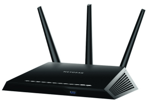 One of the black routers of FlashRouter, which is compatible with NordVPN